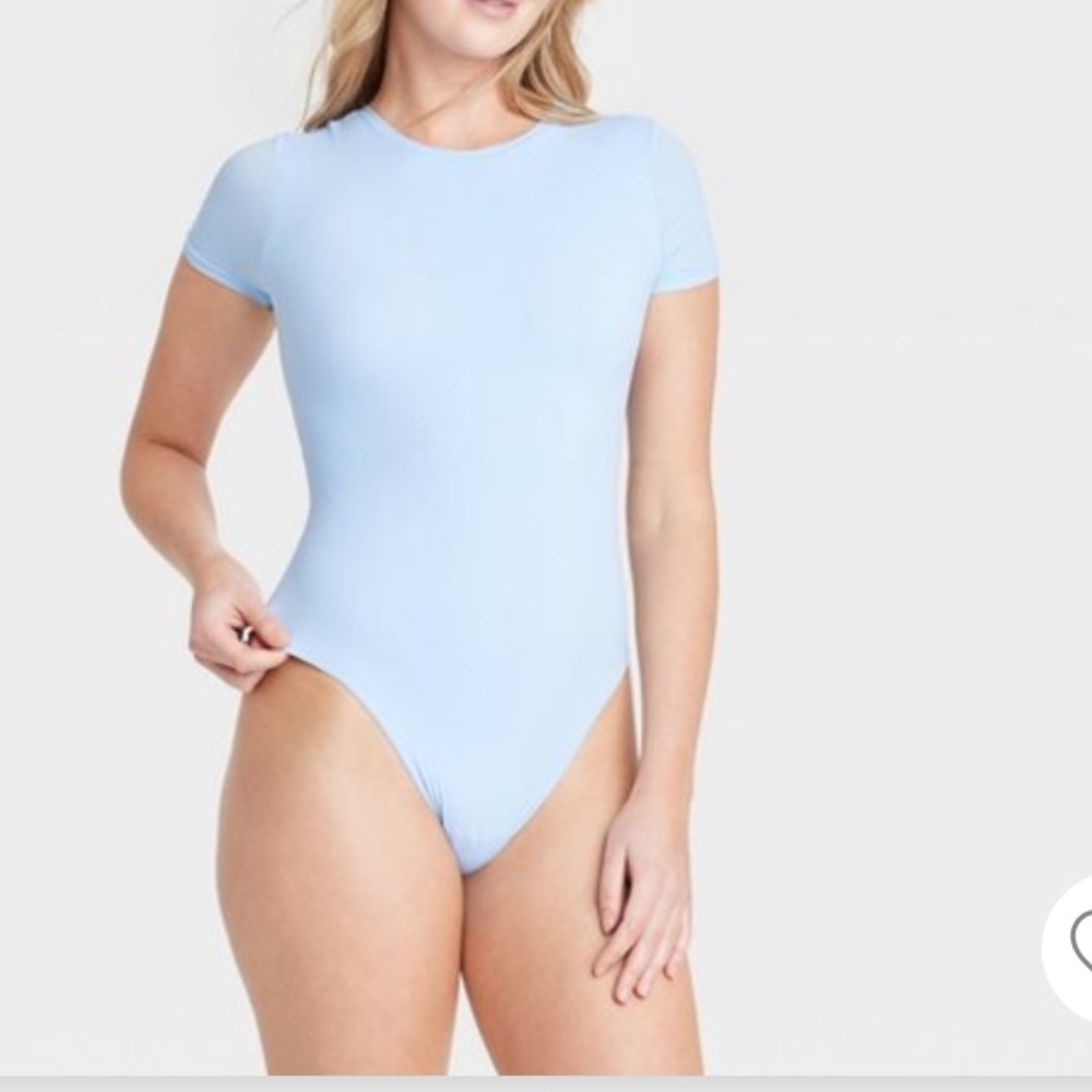 Women’s Short Sleeve Stretch Body Suit. Color blue.     Size